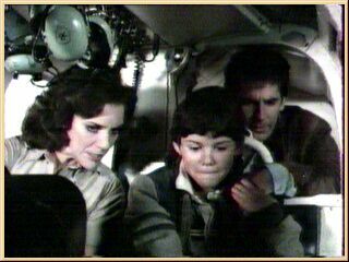 Эрик в вертолете с отцом и Карен